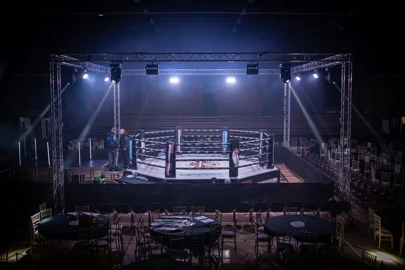 Empty boxing ring under lights before a fight night in the North East